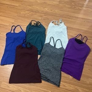 Bundle of lululemon tanks size 4